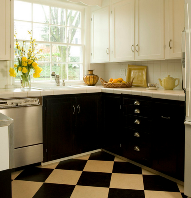 kitchen with black and white cabinets